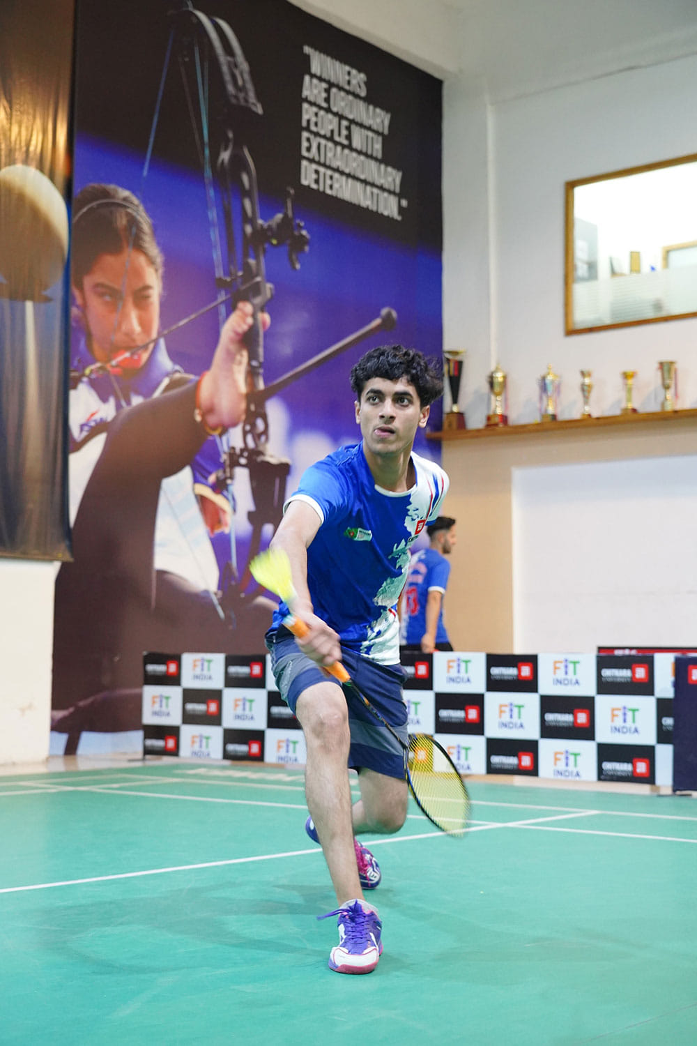 Indoor badminton smash moment