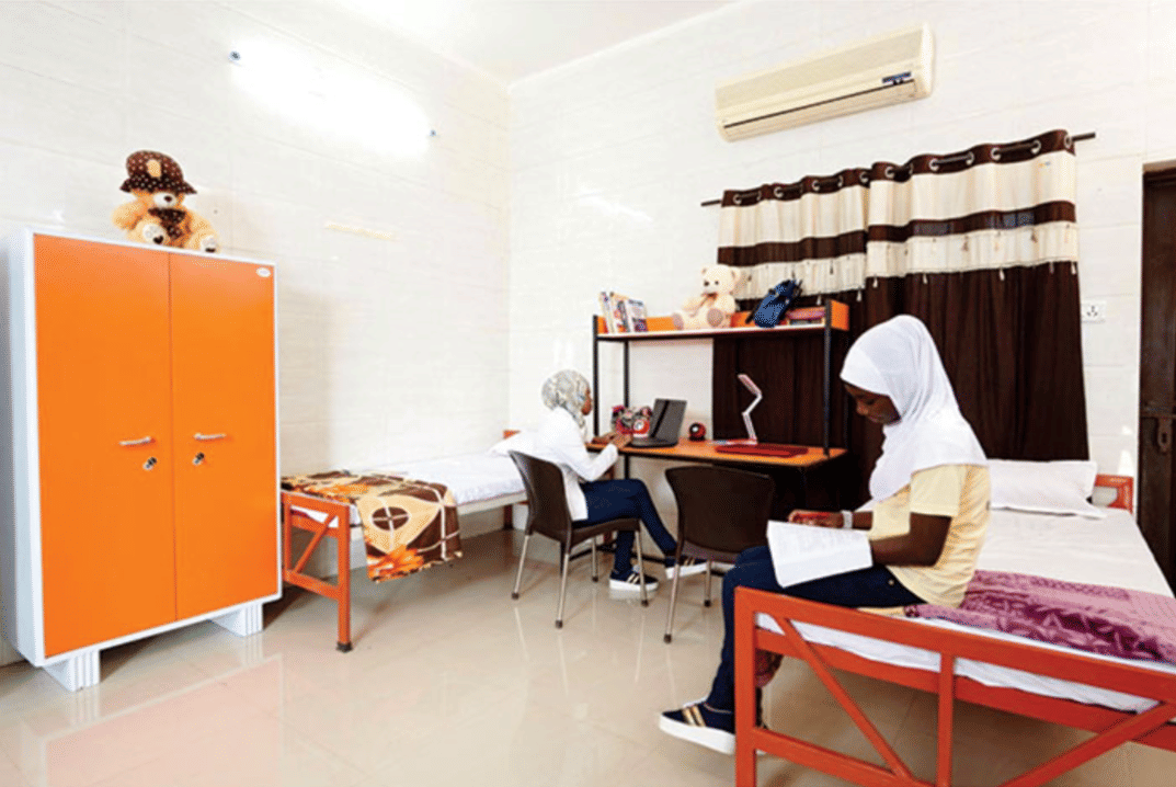 Kalinga University Hostel Room With Beds, Table, Almirah, and AC