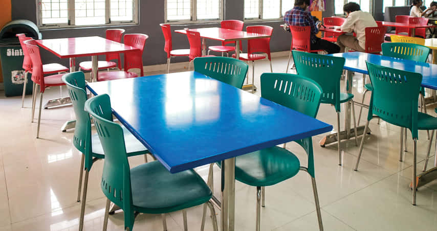 IAMR campus cafeteria with colourful seating arrangement