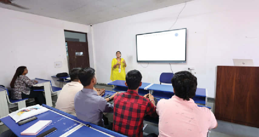 A faculty member conducting a classroom session