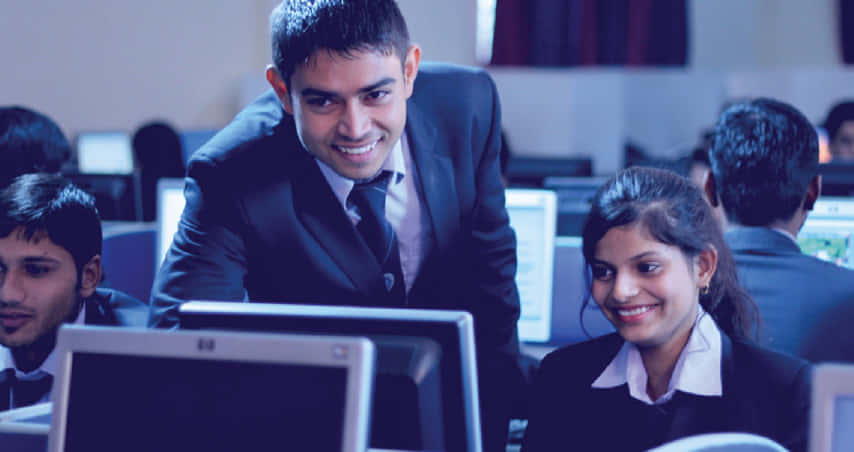 IAMR students working together in computer lab