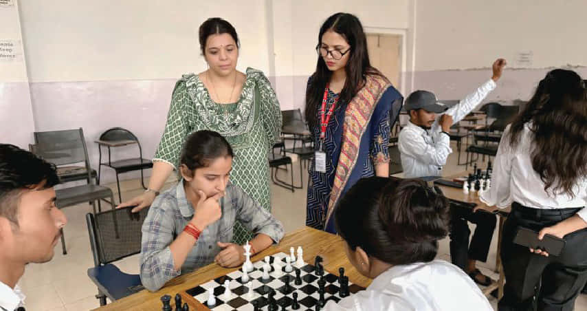 IAMR students playing chess during indoor sports activity