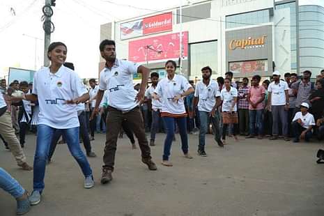 Andhra Loyola College Organises a Flash Mob and Street Play on Road Safety