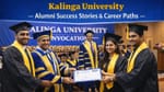 Graduation ceremony at Kalinga University where alumni students in caps and gowns receive their certificates on stage in a university hall.