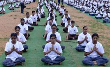 District administration of Kota Organised Yoga session for Students